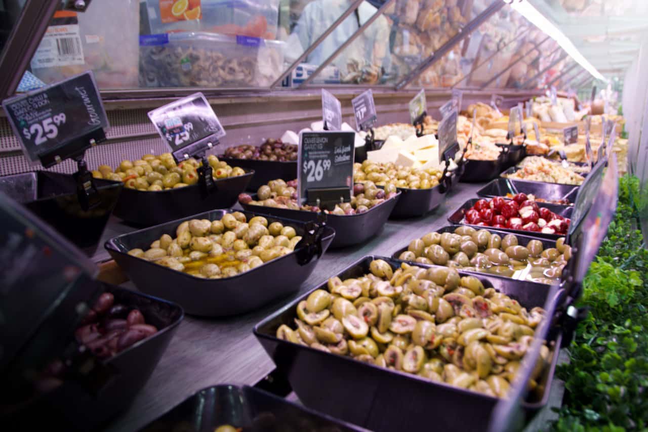 Olives and cheeses in the Deli